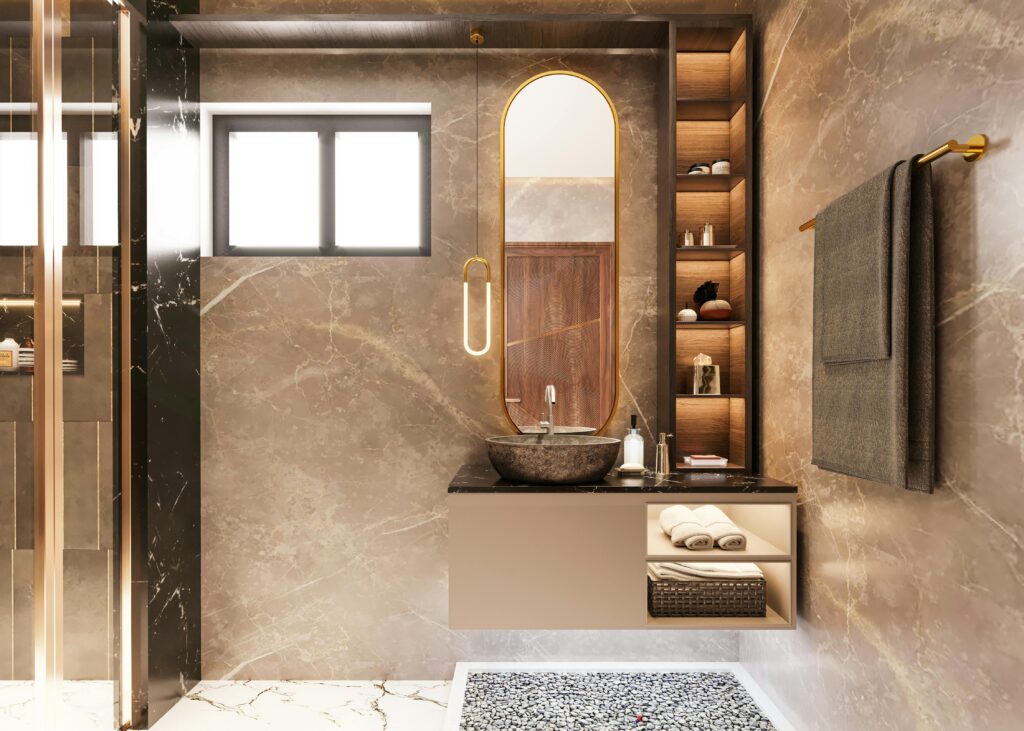 Elegant bathroom featuring marble finish, oval mirror, and stylish lighting. Ideal for modern interior design inspiration.